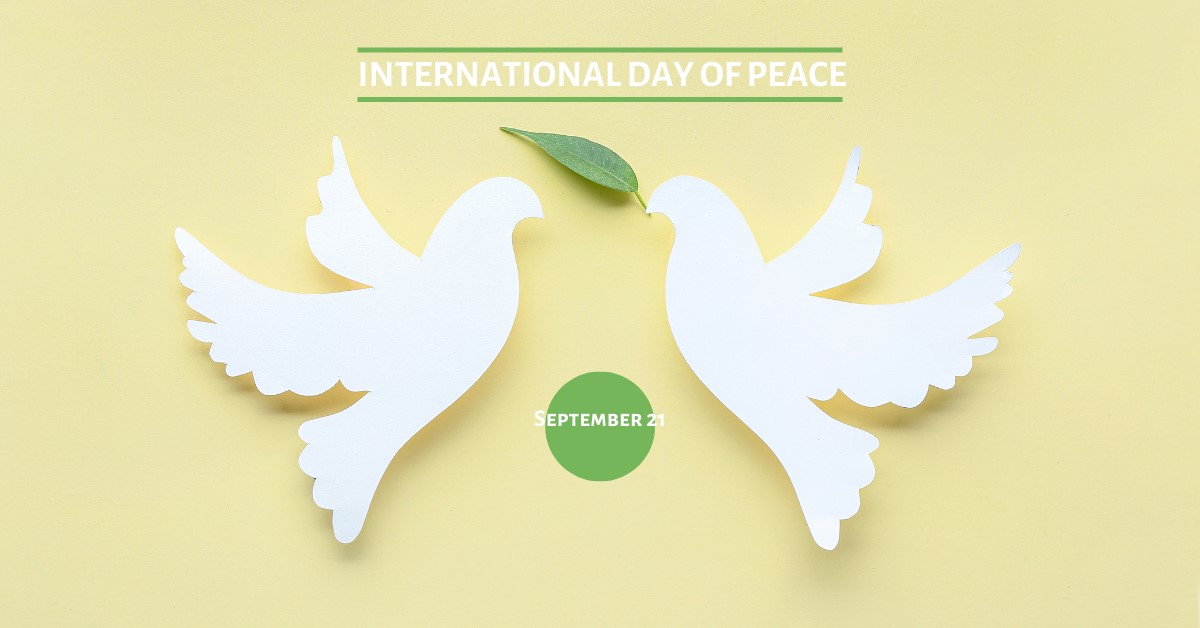 graphic of two doves with an olive leaf